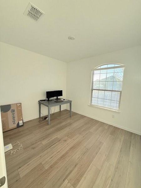 Miscellaneous room with light wood-type flooring