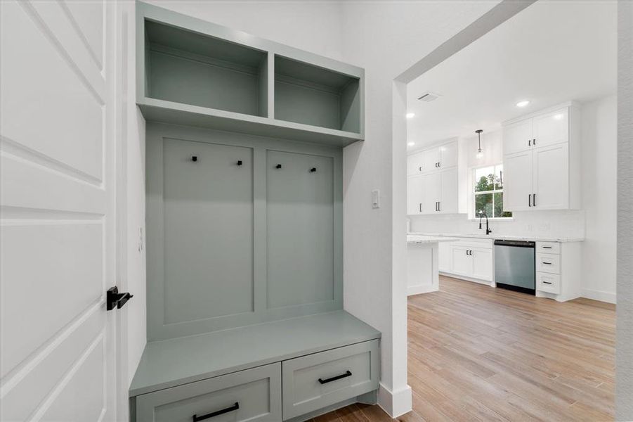 The mudroom just outside the garage. Leave the clutter behind before stepping into the main areas of your new home!