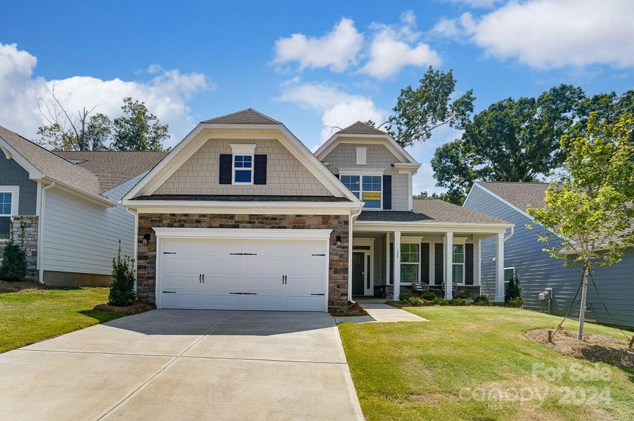 MOVE-IN READY! Homesite 54 features a Raleigh D floorplan with front-load garage.