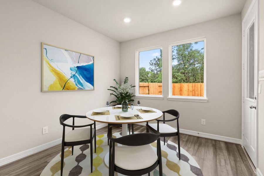 Dining area. Note: Sample product photo - actual exterior and interior selections may vary by homesite