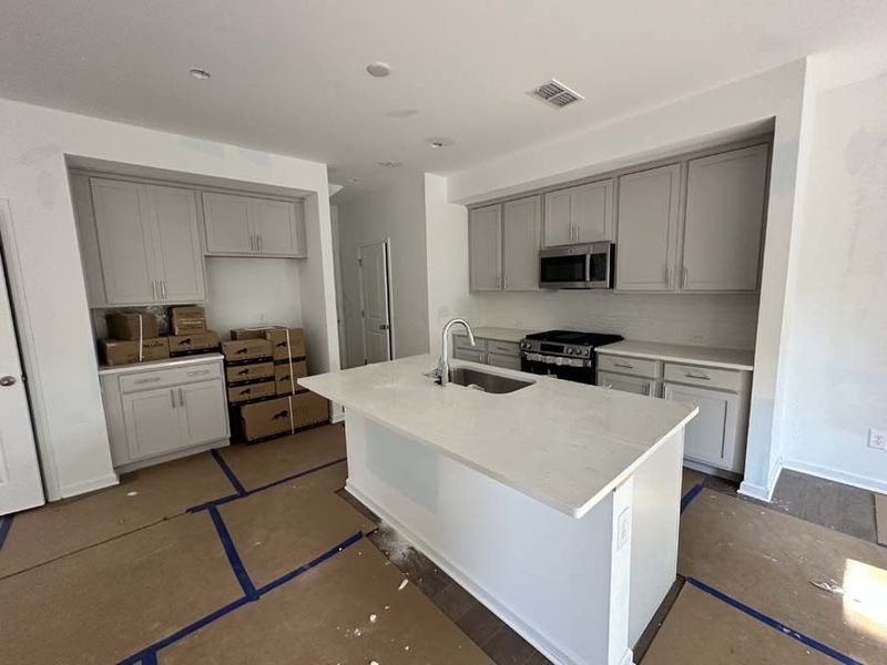 Kitchen Featuring Milan Collection Finishes Construction Progress