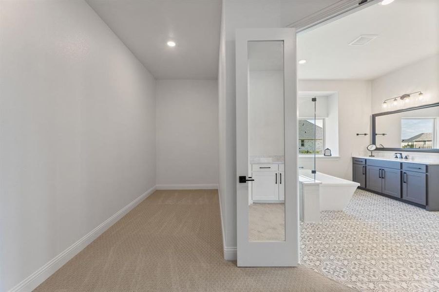 Bathroom with vanity and a bathtub