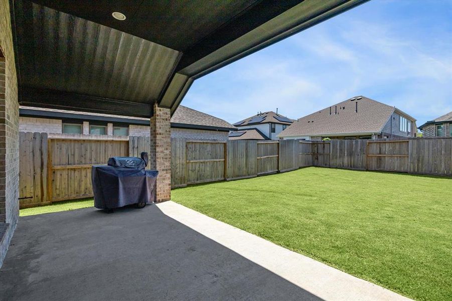 The outdoor covered patio is a wonderful space for family cookouts and outdoor enjoyment. With the protection from the elements provided by the cover, this area can be used rain or shine, extending the opportunities for outdoor activities throughout the year.