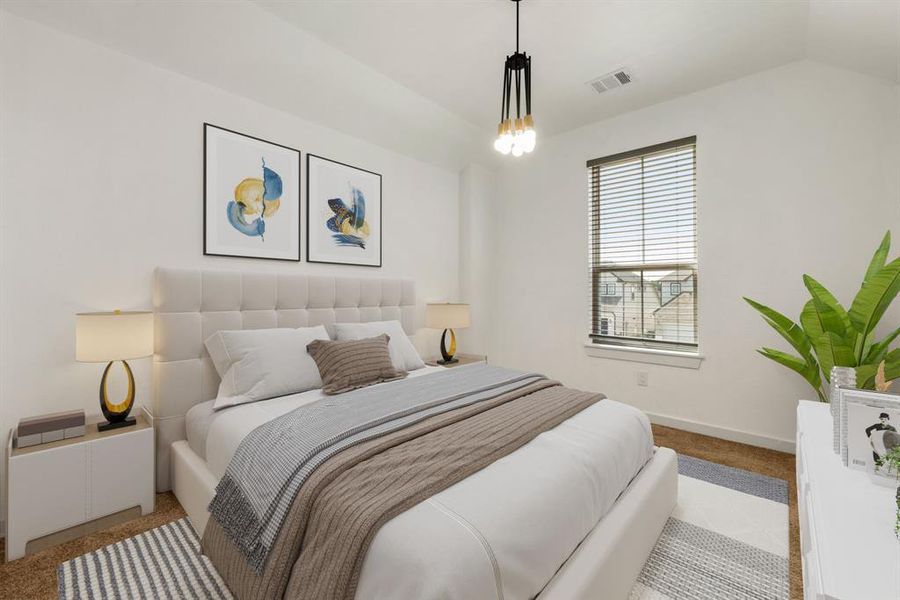 Secondary bedroom features plush carpet, neutral paint, custom lighting and a large window with privacy blinds.