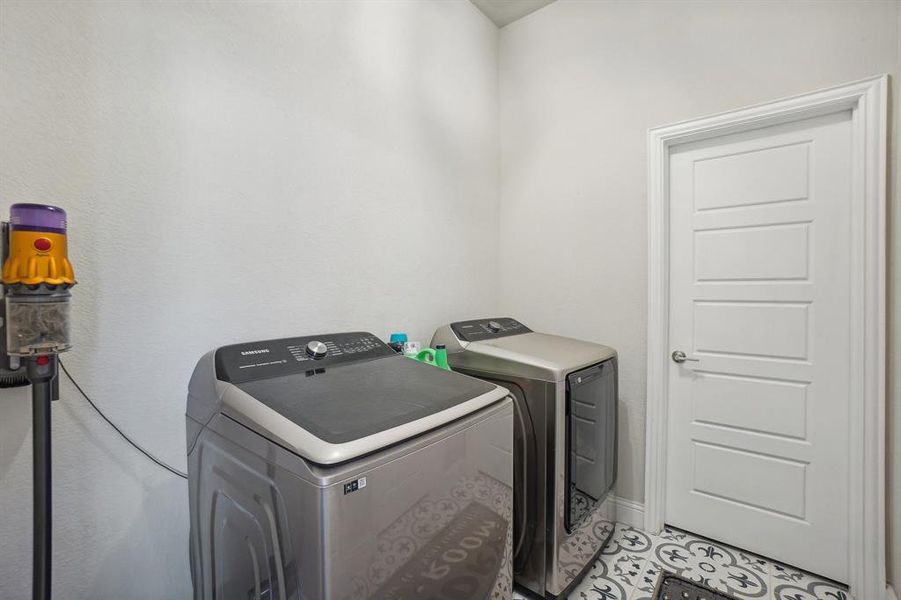 Laundry room with washer and dryer