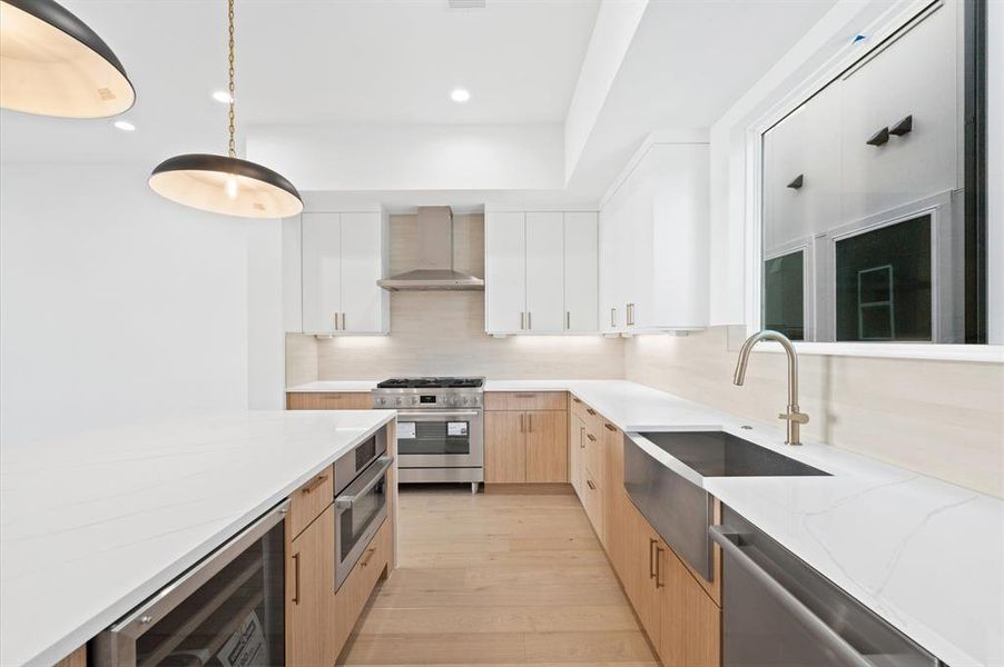 Stainless steel Bosch appliances throughout the kitchen.