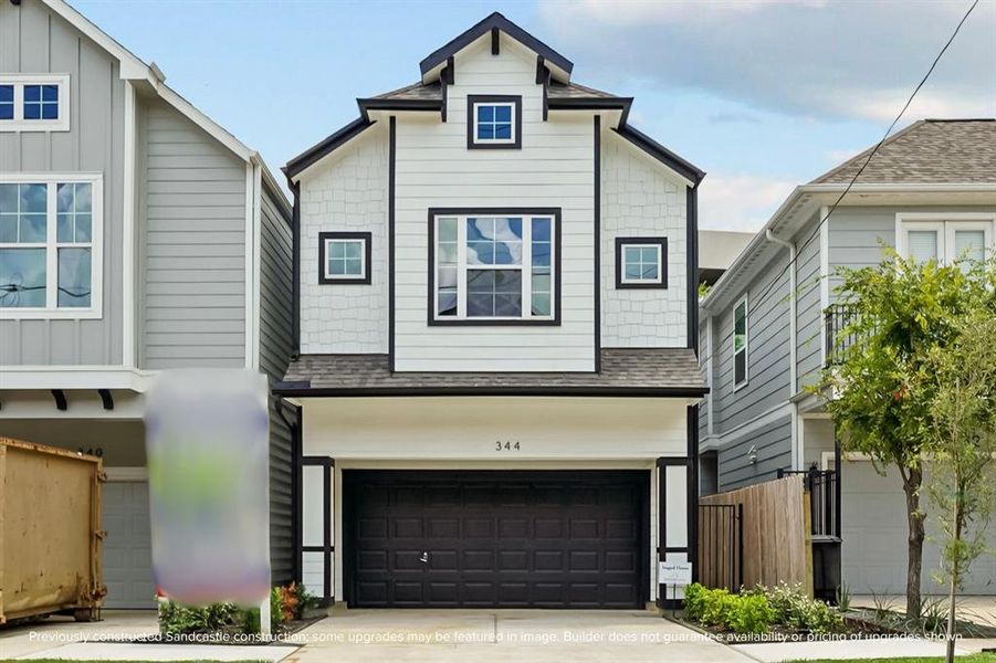 A durable Hardie Plank exterior with a charming mix of lap and shingle siding greets you, guiding you through a graceful gated entrance.