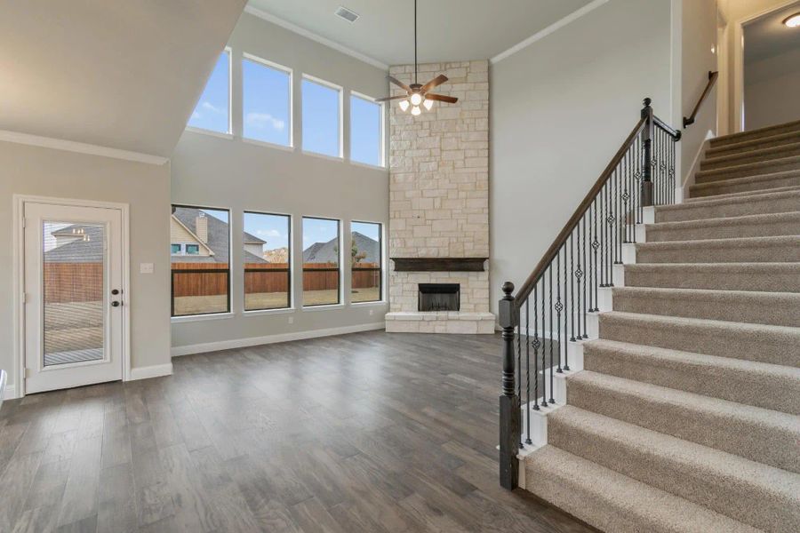 Family Room | Concept 3218 at Belle Meadows in Cleburne, TX by Landsea Homes