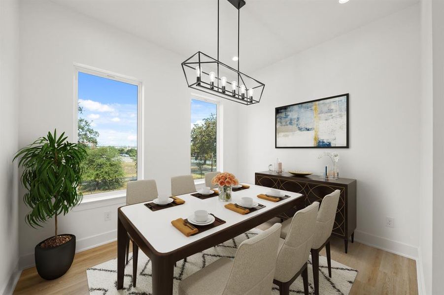 Virtually Staged: Incredible bonus space that is virtually staged as a dining room, could also make a fantastic home office. Photos are from a similar unit in the development.