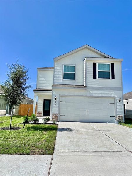 The is a beautiful 2-story home with upgraded siding and modern curb appeal. You will love the color of the home!