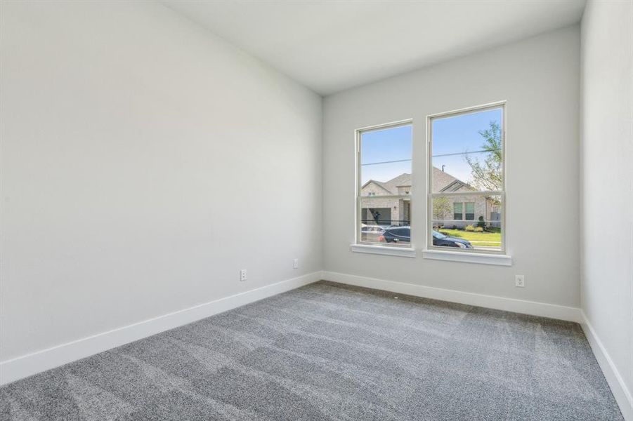 Empty room with carpet flooring