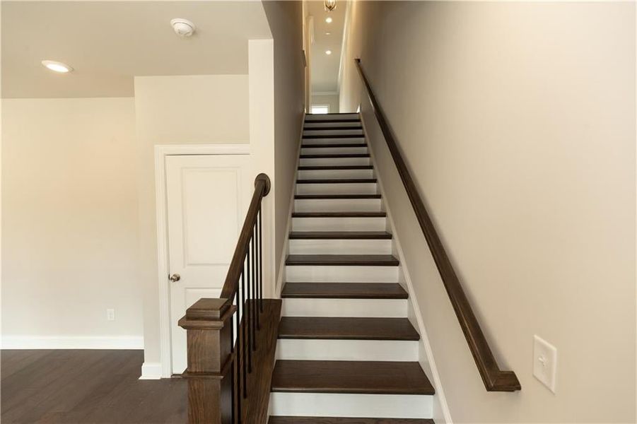 Door to two-car garage in foyer flex space