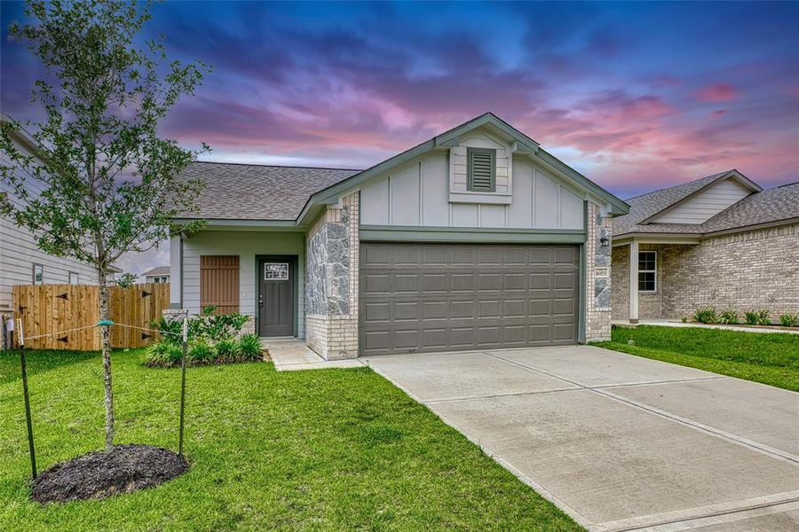 Welcome to this delightful, brand-new residence nestled in Granger Pines. Offering 3 bedrooms and 2 baths, this home presents an inviting exterior with a charming facade blending stone, brick, and durable cement board. A double-wide driveway leads to a convenient 2-car attached garage.