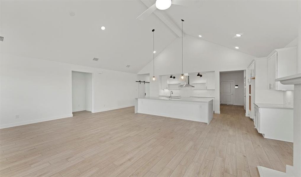 great room and dining area off the kitchen in our Santa Rosa home design in Loft palette 3. (*Photo not of actual home and used for illustration purposes only.)