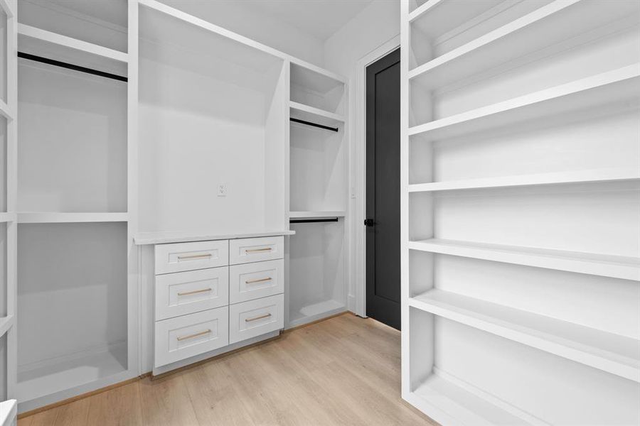 One of 2 walk in closet with built ins.