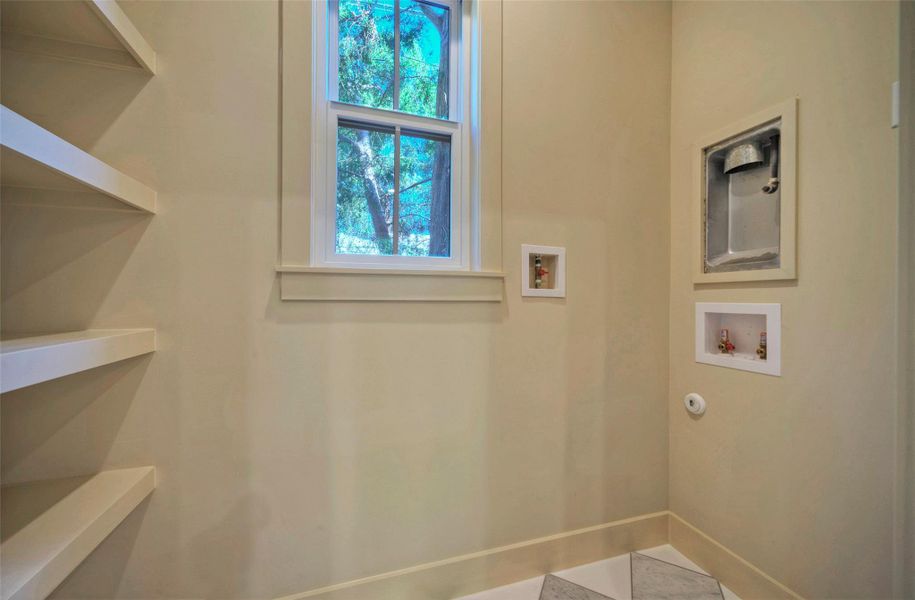 Spacious pantry and laundry room