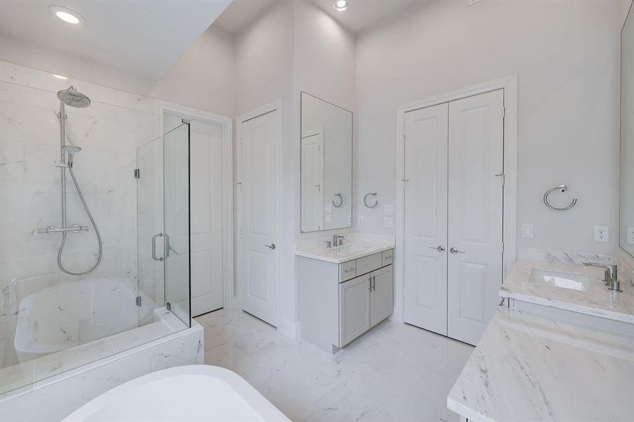 Relax in a Marble Bathroom - Free Standing Tub and Frameless Seated Shower