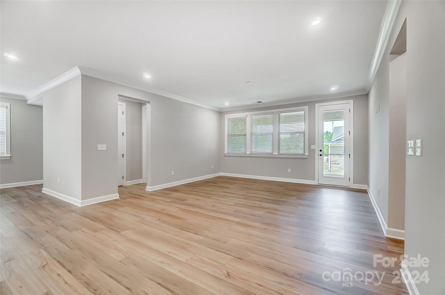 Gathering Room with Door to Screened Porch-Similar to Subject Property