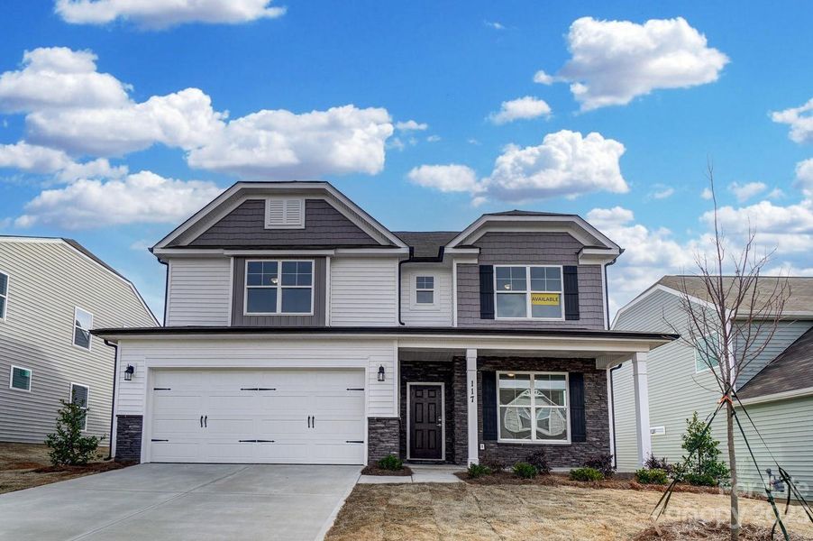 Homesite 20 features the Davidson plan with a front load garage.