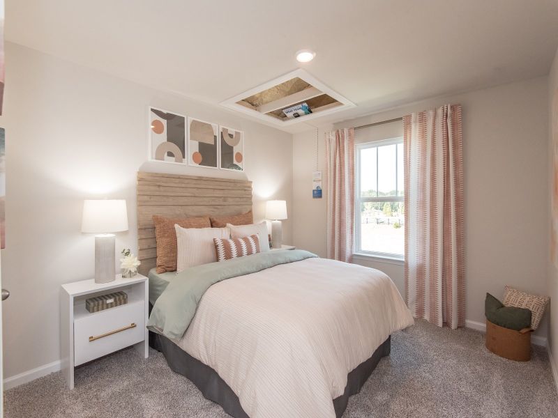 The Johnson floorplan offers four secondary bedrooms to accommodate family and overnight guests.