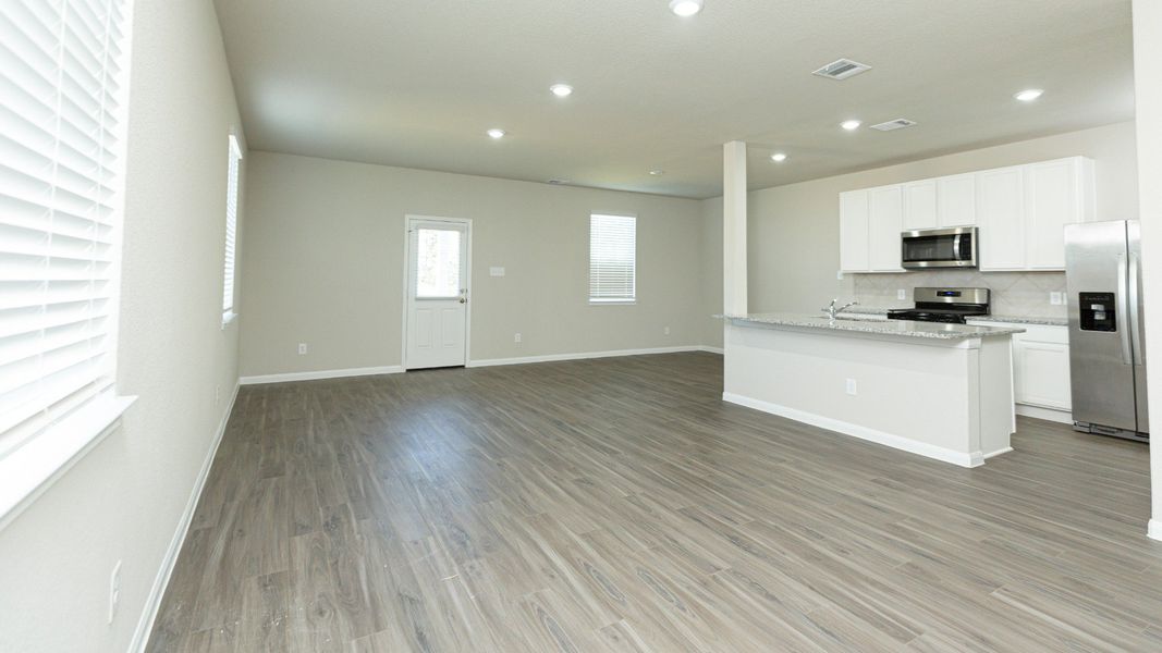 Family Room to Kitchen and Dining Area