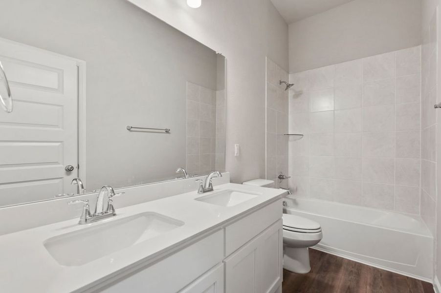 Bathroom in the Quartz home plan by Trophy Signature Homes – REPRESENTATIVE PHOTO