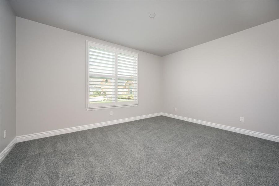 Second bedroom with carpet