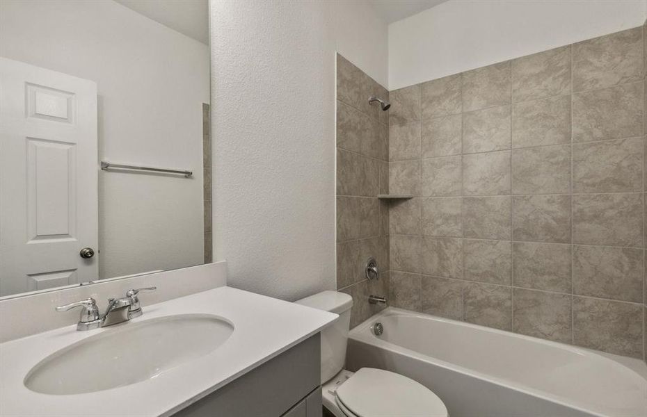 Spacious secondary bathroom*real home pictured