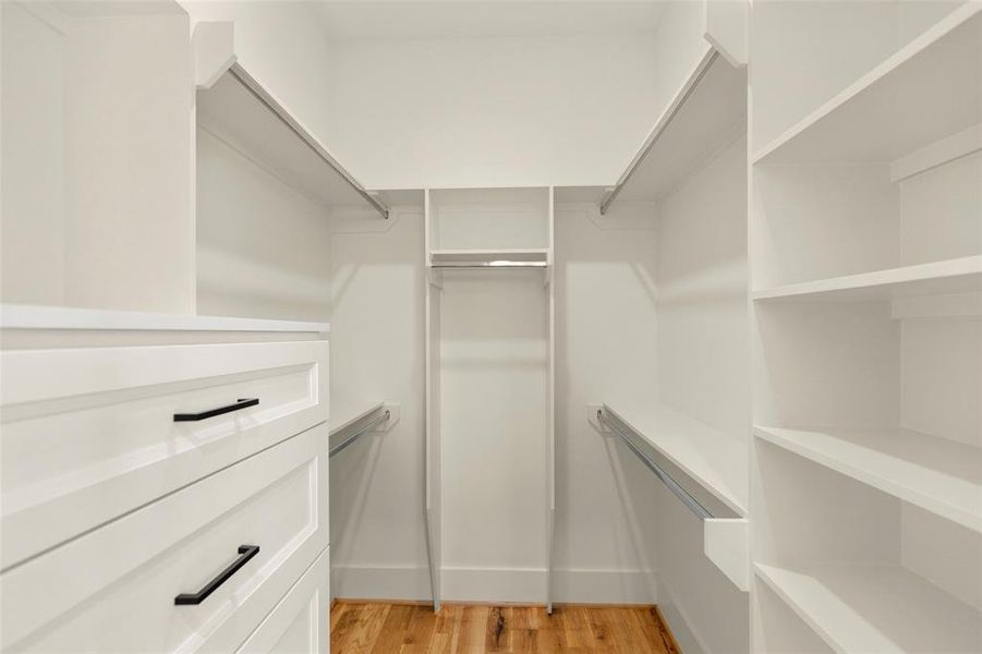 One of two owners closets, generous drawers as well as  shelf spaces