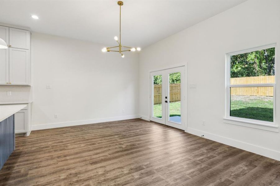 Massive dining room has plenty of space for a large table, side table or hutch.