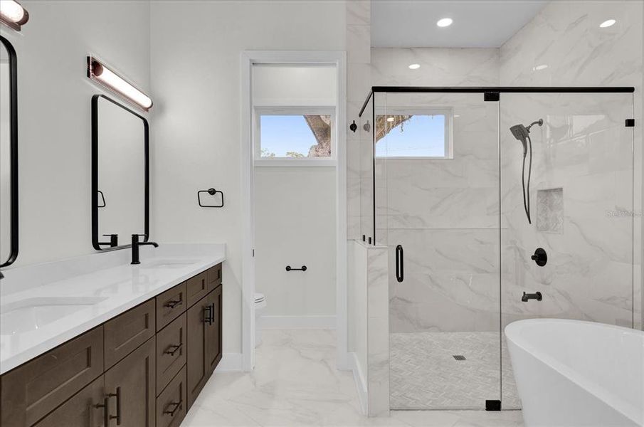 Primary bathroom has all of the features you'll need!