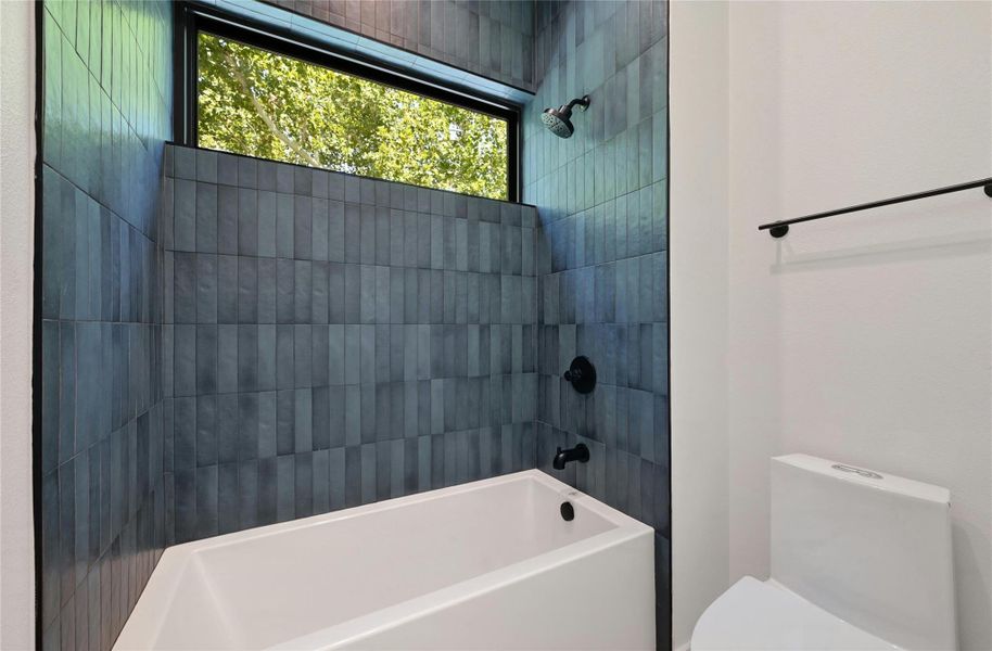 Secondary bathroom with tub and shower