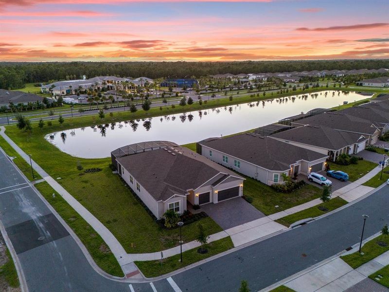 Twilight ariel view of the home with waterview