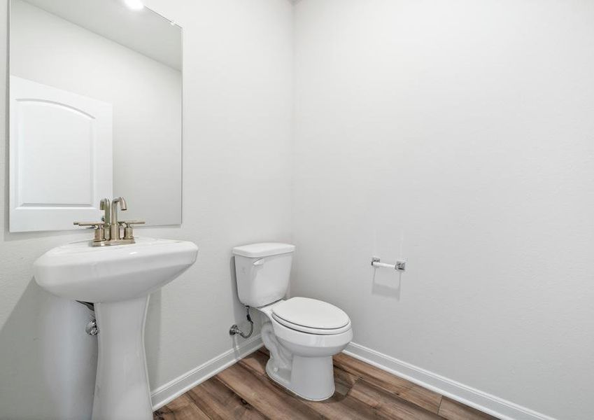 The powder room of the Cypress has a toilet and sink.