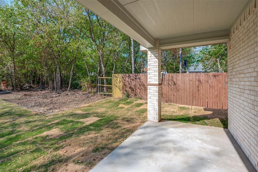 View of yard with a patio