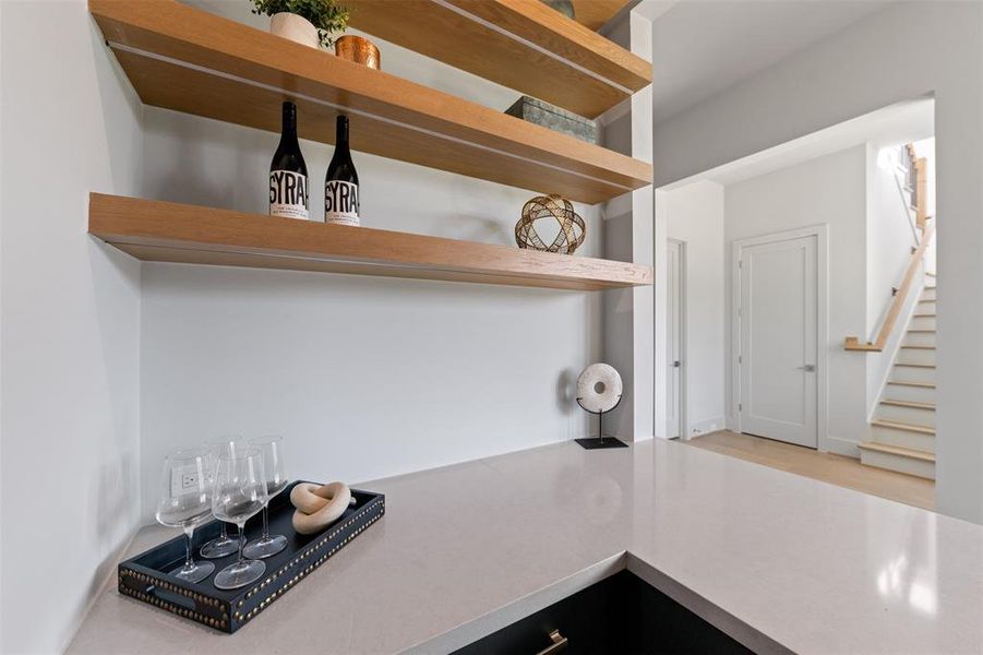 This custom bar area is perfect for entertaining. Welcome guests into your home with a fresh beverage.