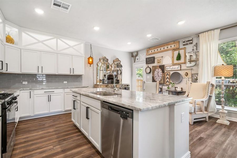 Boxes were added to extend cabinets to ceiling, along with over and under cabinet lighting!