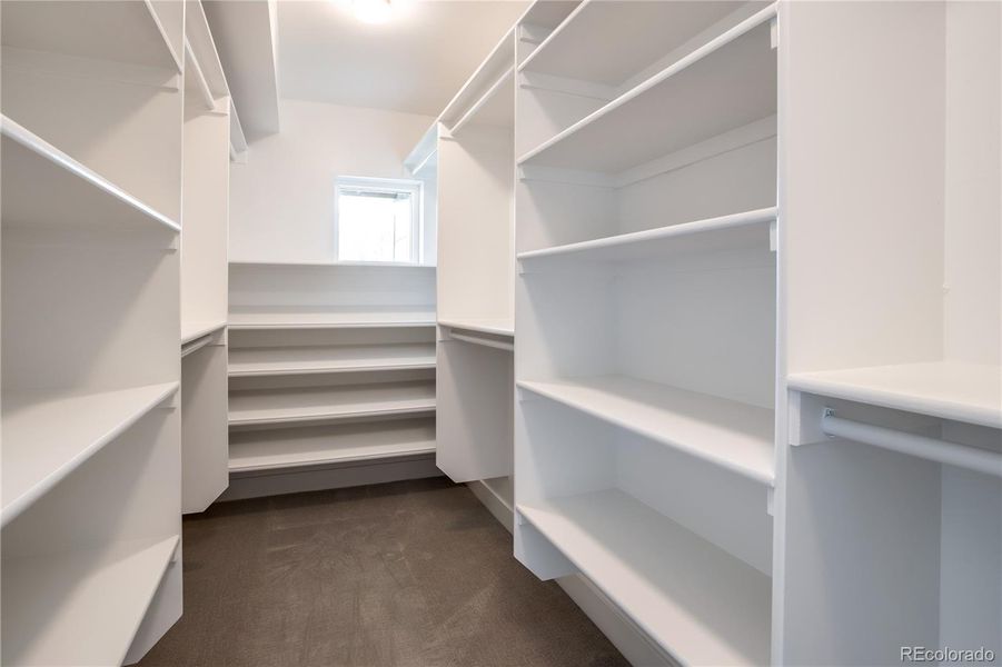 Expansive built out walk-in closet