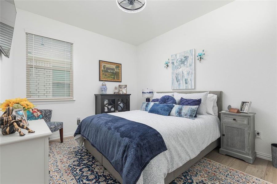 Bedroom featuring light hardwood / wood-style flooring