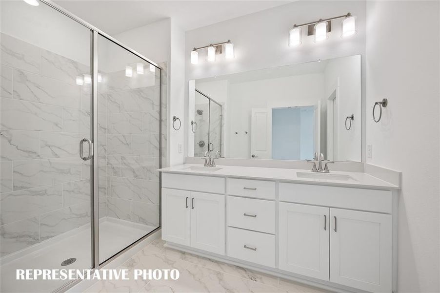 With space for two and an oversized walk in shower, this owner's bath won't disappoint!  REPRESENTATIVE PHOTO