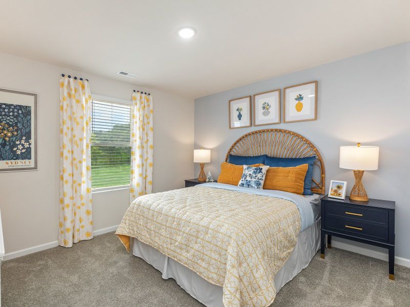 Secondary bedroom in the Chatham floorplan at a Meritage Homes community in Angier, NC.