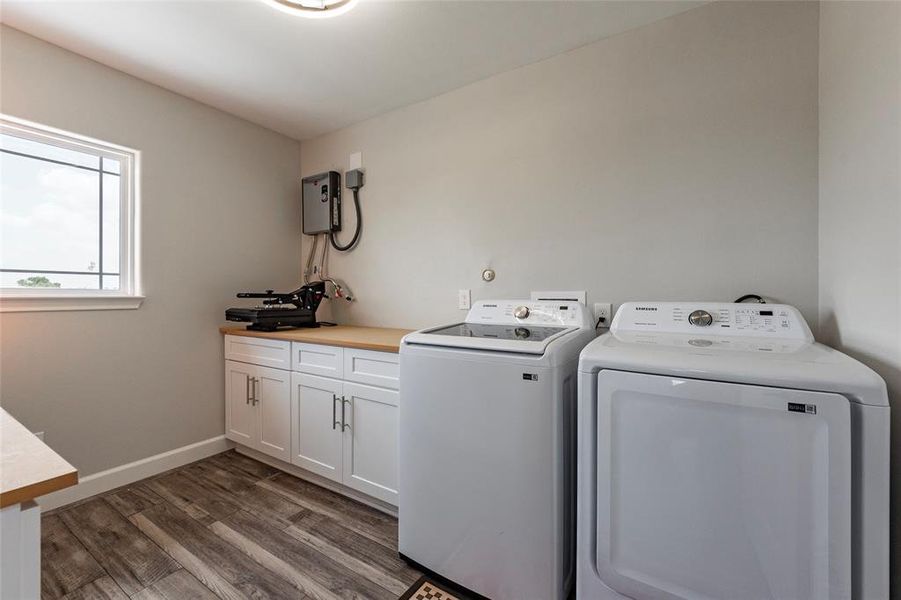 The adjacent utility room is plumbed for a sink, adding potential for even more convenience