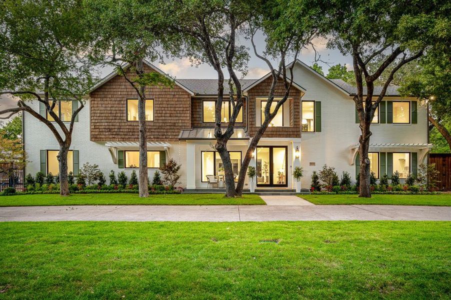 View of front of house with a lawn