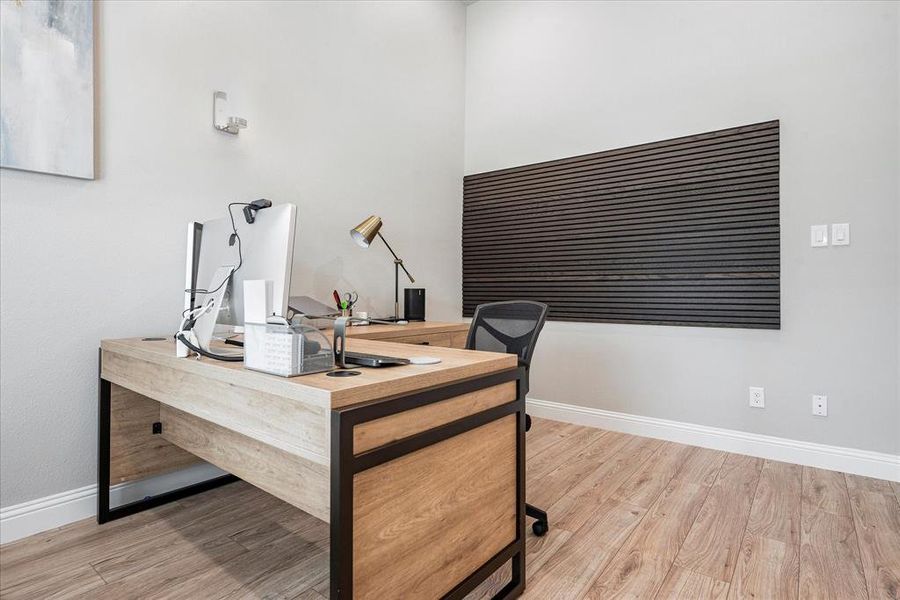 Office area with wood-type flooring