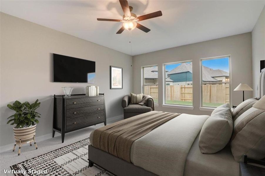 Master bedroom bathed in natural light, featuring a spacious ensuite bathroom for ultimate comfort.