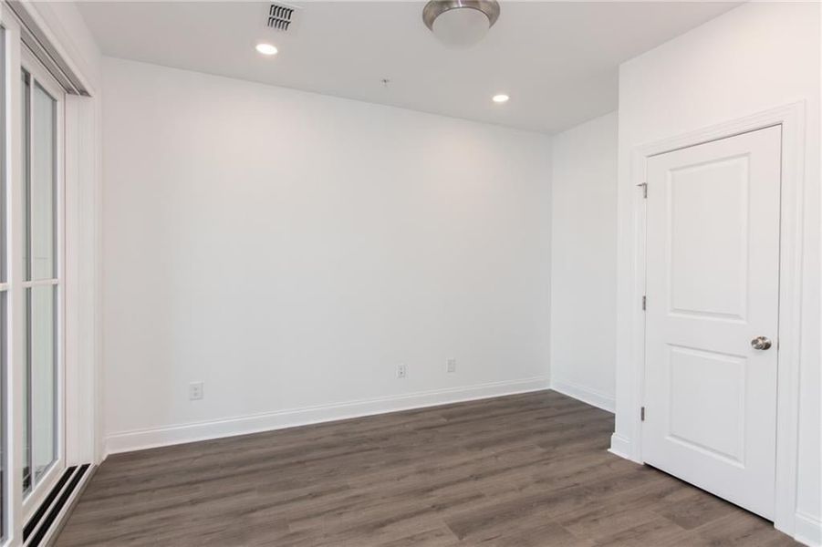 Office/ media / Bonus Room with the door leading to the garage . not the actual building previously built