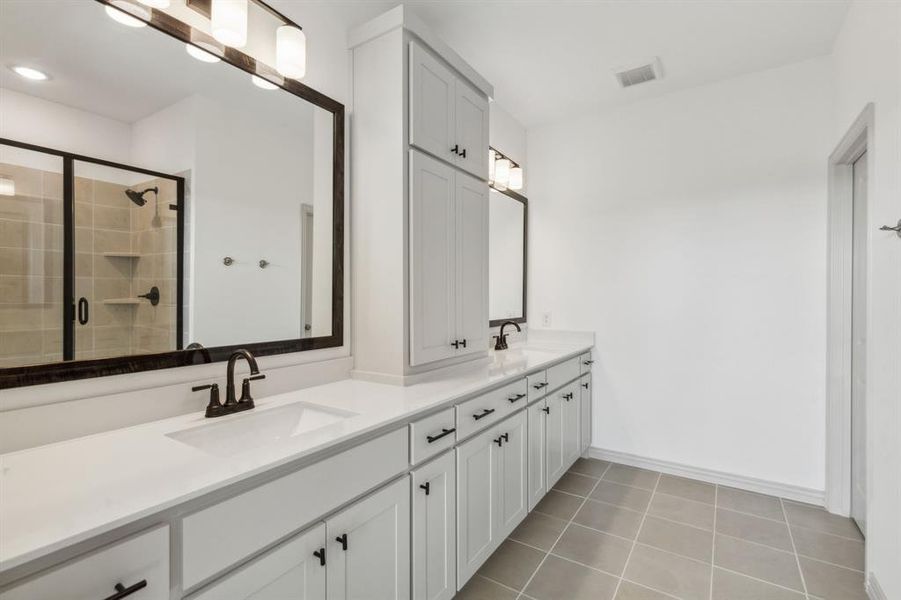 No shortage of space or style in this wonderful owner's bath!