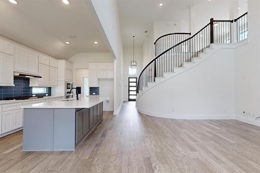 View showing Family room, Kitchen  and Entry