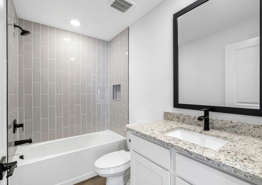The secondary bathroom provides your guests all the space they need to get ready in the mornings