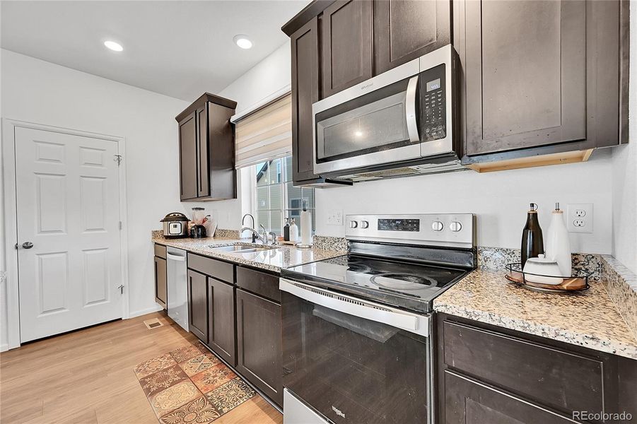 This kitchen offers spacious countertops, upgraded cabintry and a walk-in pantry! Perfect for cooking homemade meals!